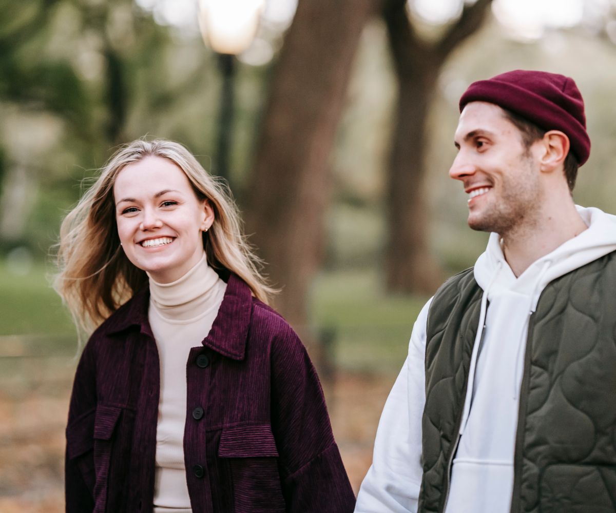Two people walking together outdoors
